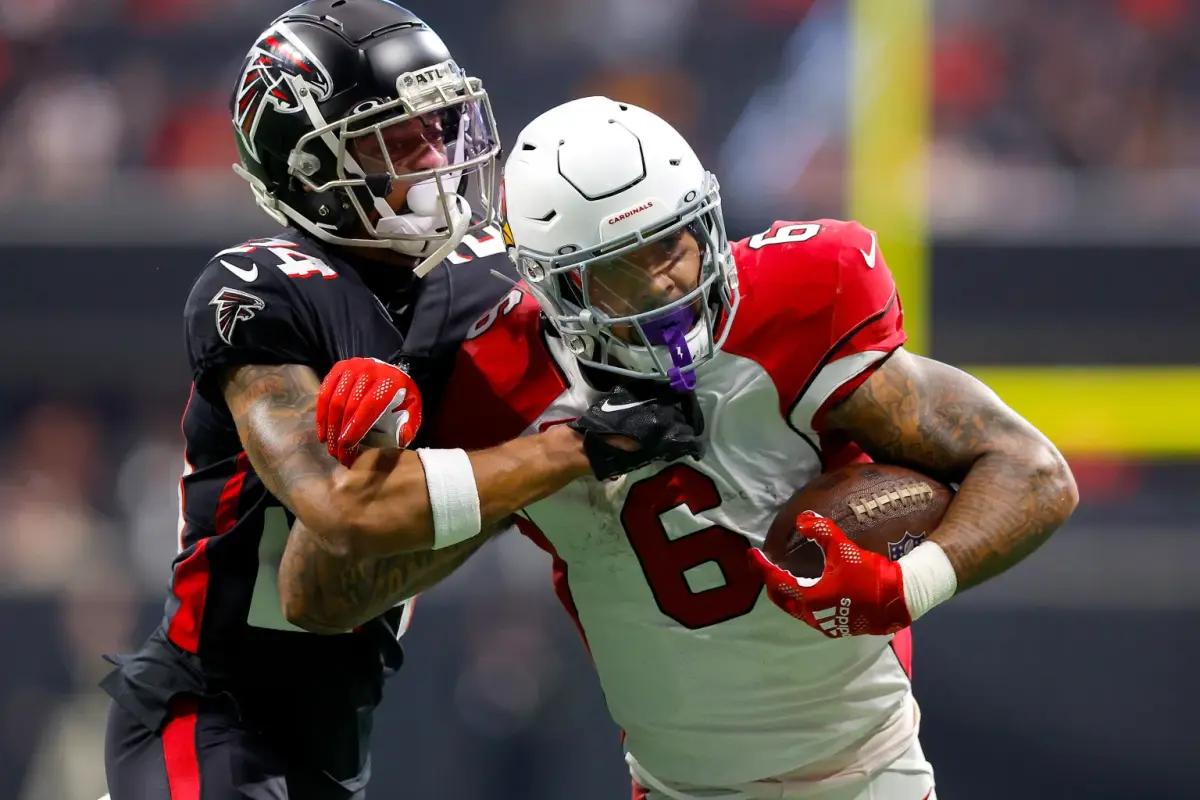 Atlanta Falcons cornerback A.J. Terrell tackling Arizona Cardinals running back James Conner.